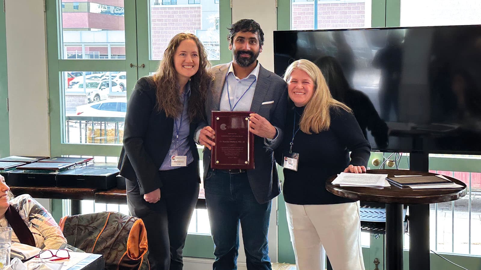 Three people, including CarePoint Health's Ramnik "Ricky" Dhaliwal, posing for a photo