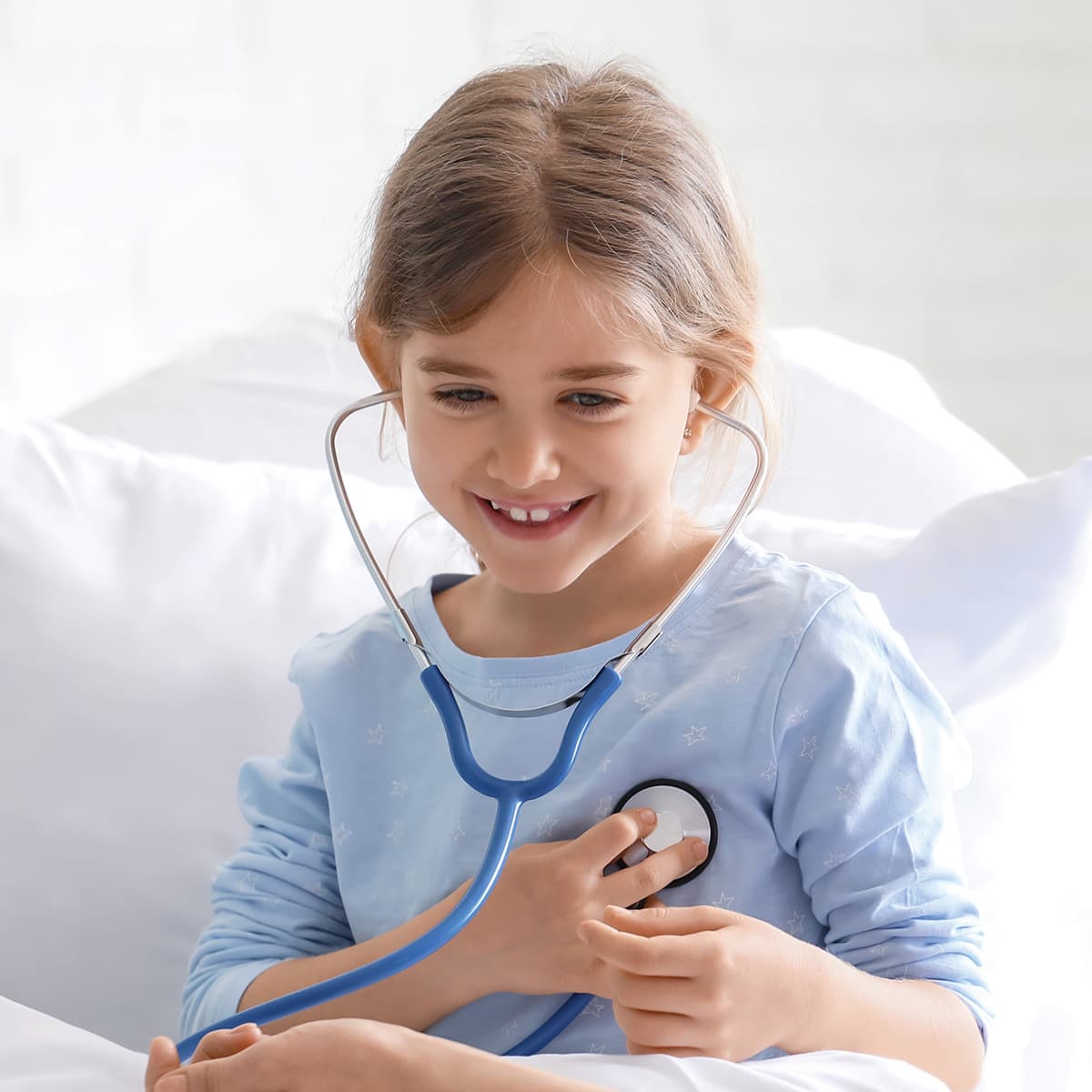 Girl in hospital bed