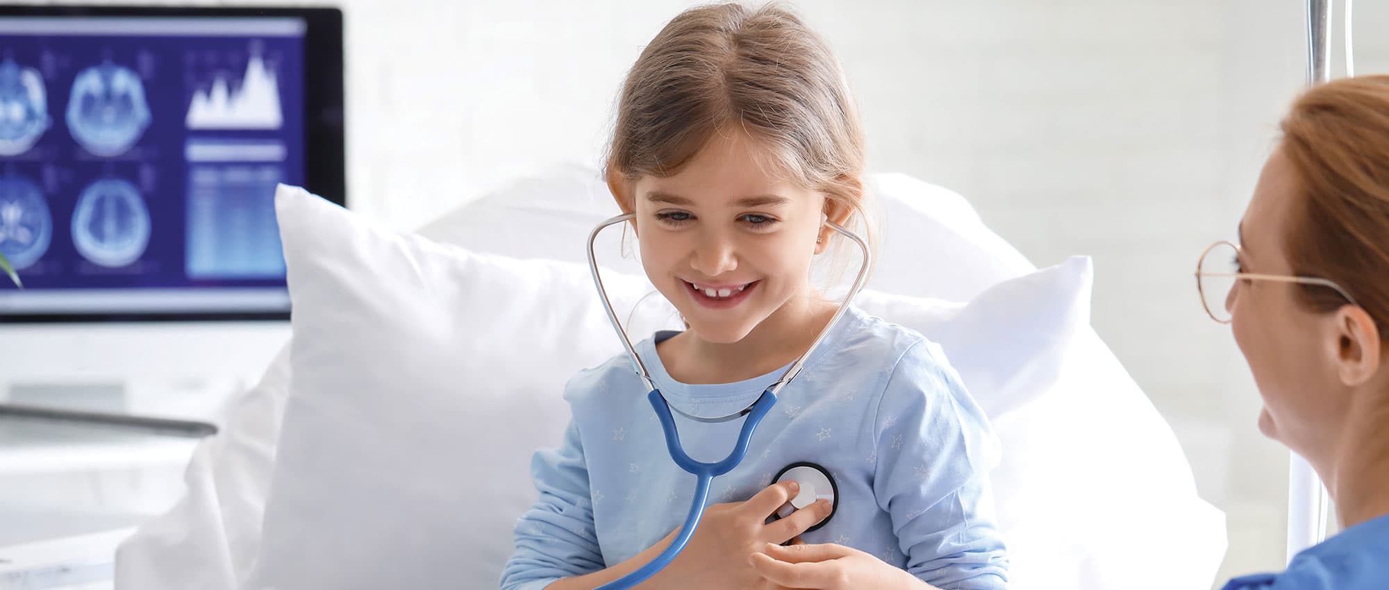 Girl in hospital bed