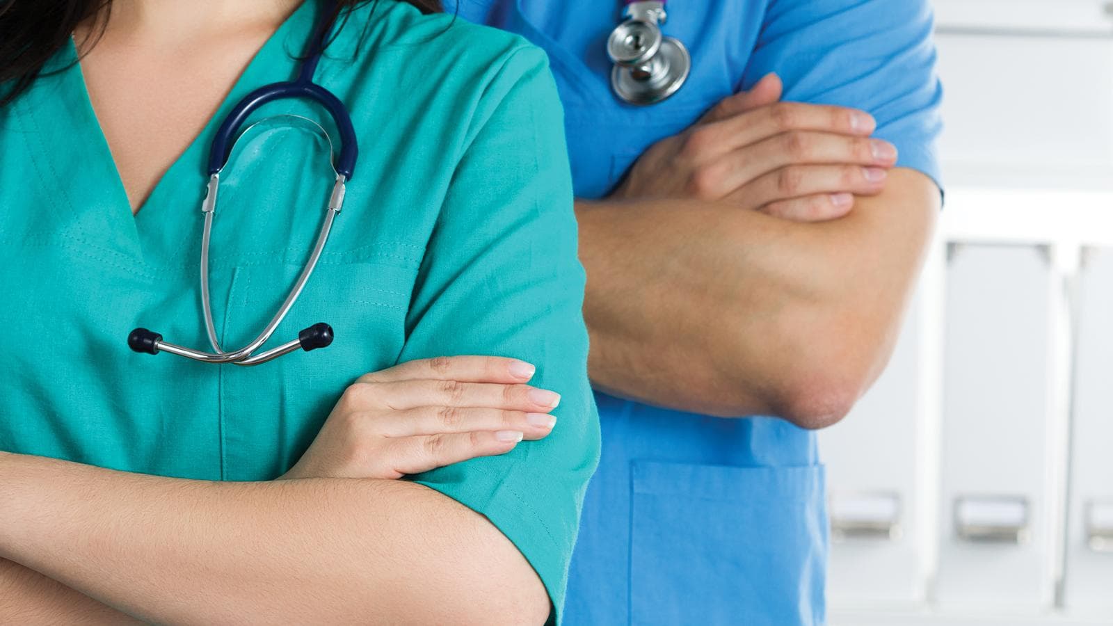Two doctors crossing their arms
