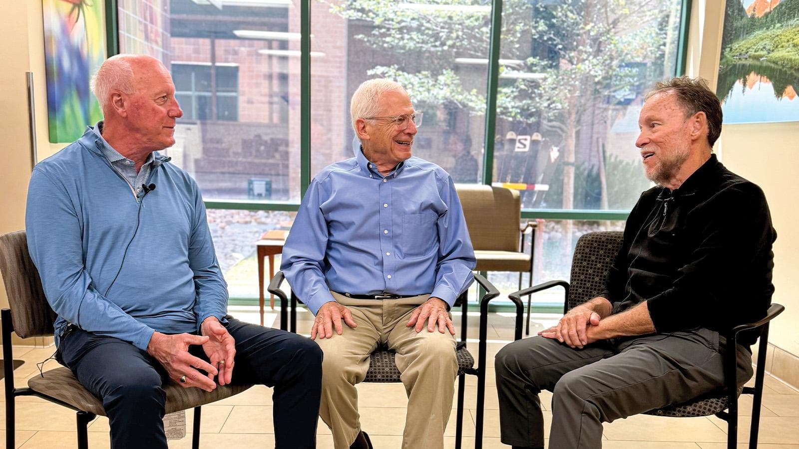 Drs. Steve Heinz, Steve Hoffenberg, and Don Lefkowits sit and talk with each other.